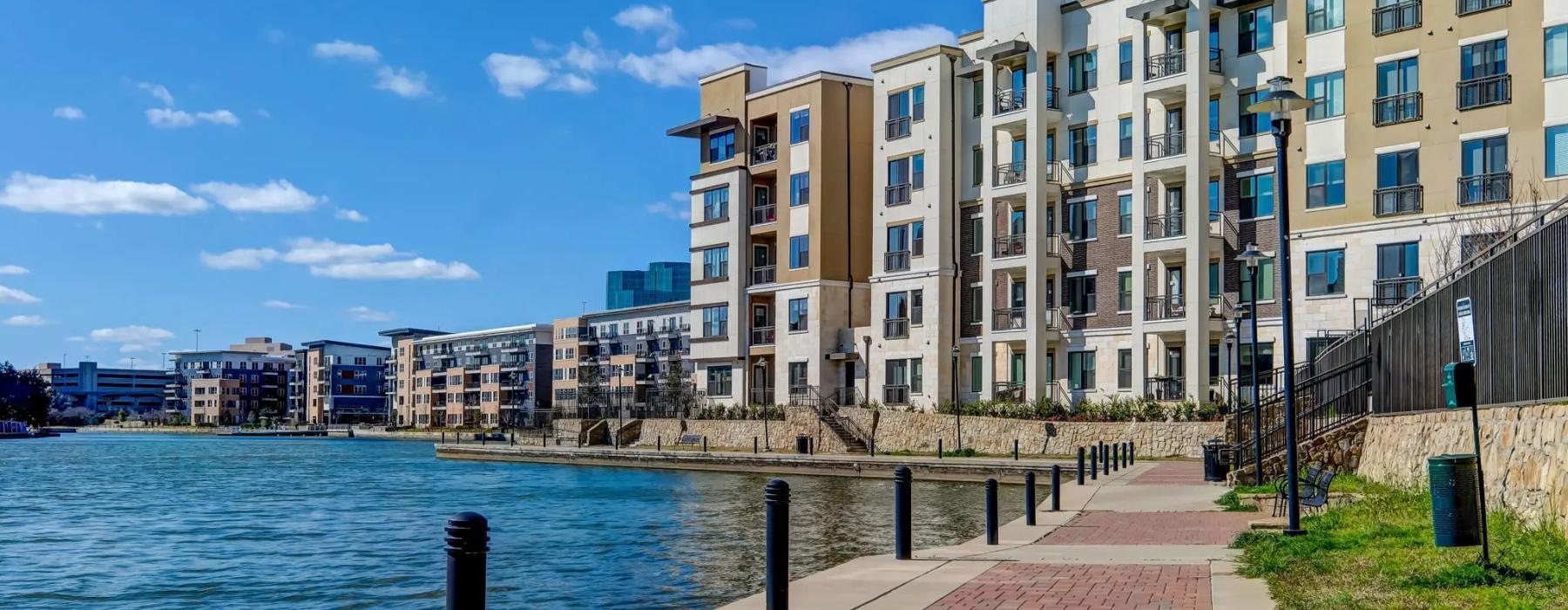 a body of water with buildings along it