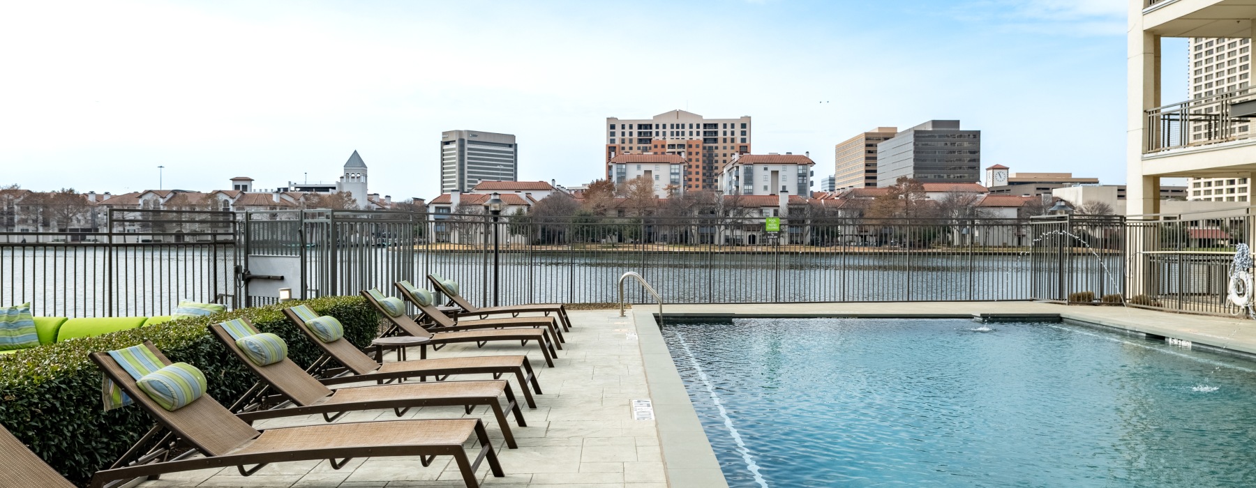 Luxury apartments overlooking Lake Carolyn at The Banks at Las Colinas in Irving, Texas